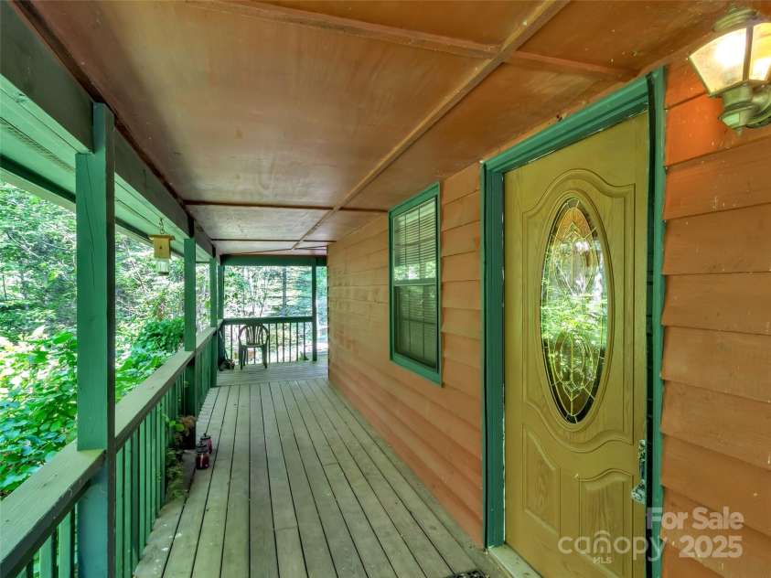 57 Copperhead Cove, Sylva, NC 28779.  MLS# CAR4273722, YatesRealty ID 28247. 