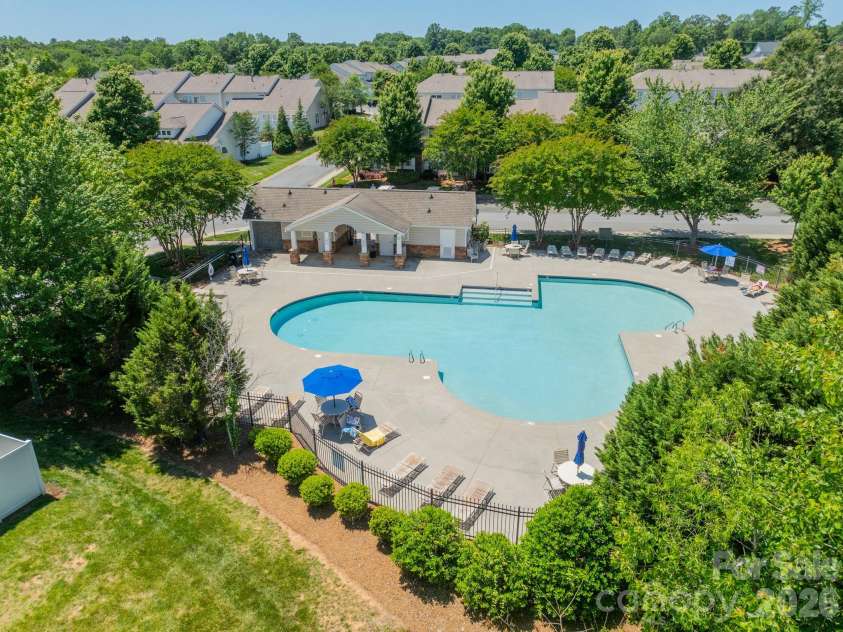 464 Spring Gardens Drive, Belmont, NC 28012.  MLS# CAR4385090, YatesRealty ID 28248. Waters Edge community pool