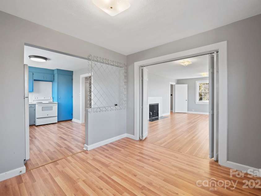 112 Bleynat Street, Valdese, NC 28690.  MLS# CAR4138577, YatesRealty ID 2825. Dining Room looking towards living room and kitchen