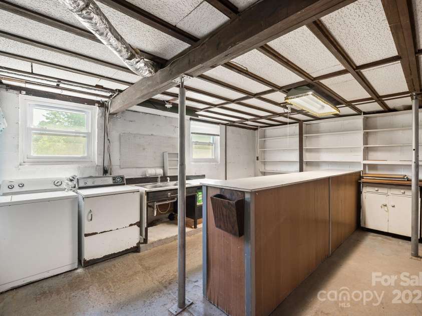 112 Bleynat Street, Valdese, NC 28690.  MLS# CAR4138577, YatesRealty ID 2825. Wood burning FP, laundry, utility sink, workshop