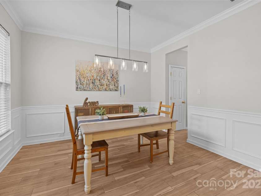 3018 Early Rise Avenue, Indian Trail, NC 28079.  MLS# CAR4283685, YatesRealty ID 28251. Just painted dining room is ideal for holiday gatherings and entertaining guests in style.