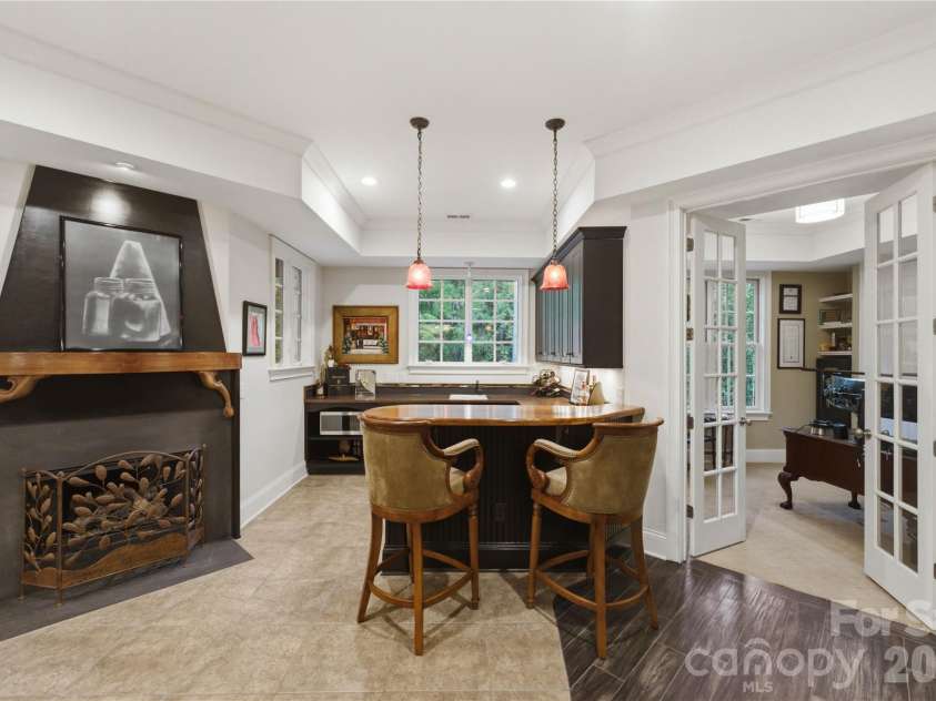 1514 Elmsford Lane, Matthews, NC 28105.  MLS# CAR4371432, YatesRealty ID 28254. 3rd Fireplace