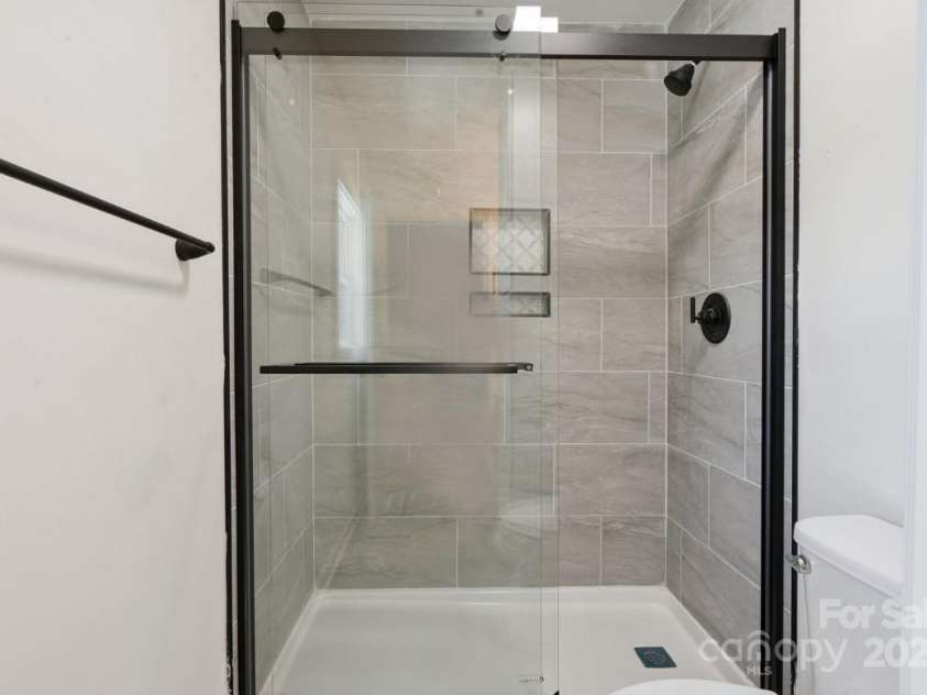 318 Cedarwood Lane, Matthews, NC 28104.  MLS# CAR4282132, YatesRealty ID 28255. 