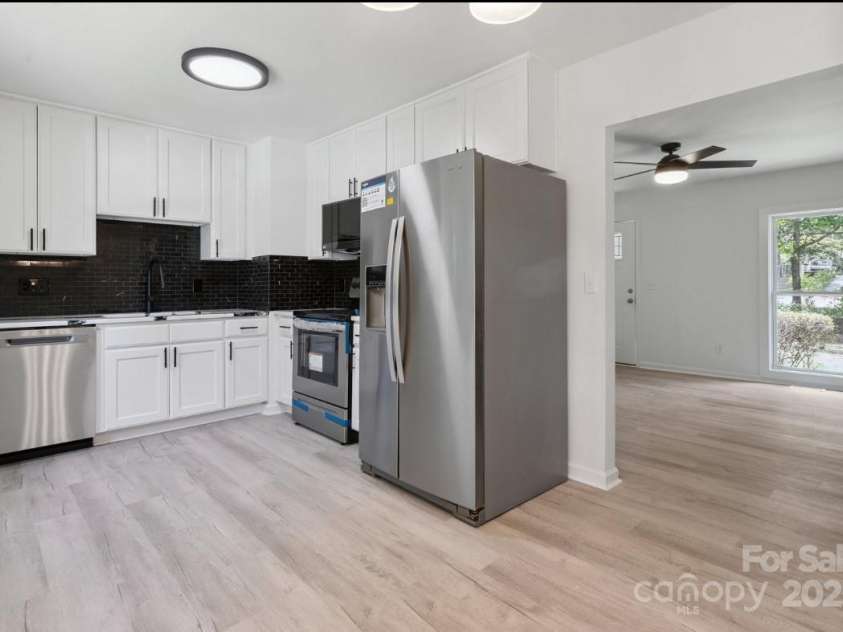 318 Cedarwood Lane, Matthews, NC 28104.  MLS# CAR4282132, YatesRealty ID 28255. 