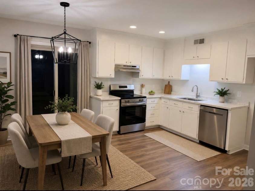6921 Kirkcaldy Lane, Mint Hill, NC 28227.  MLS# CAR4382265, YatesRealty ID 28258. Dining Room & Kitchin - Virtually Staged