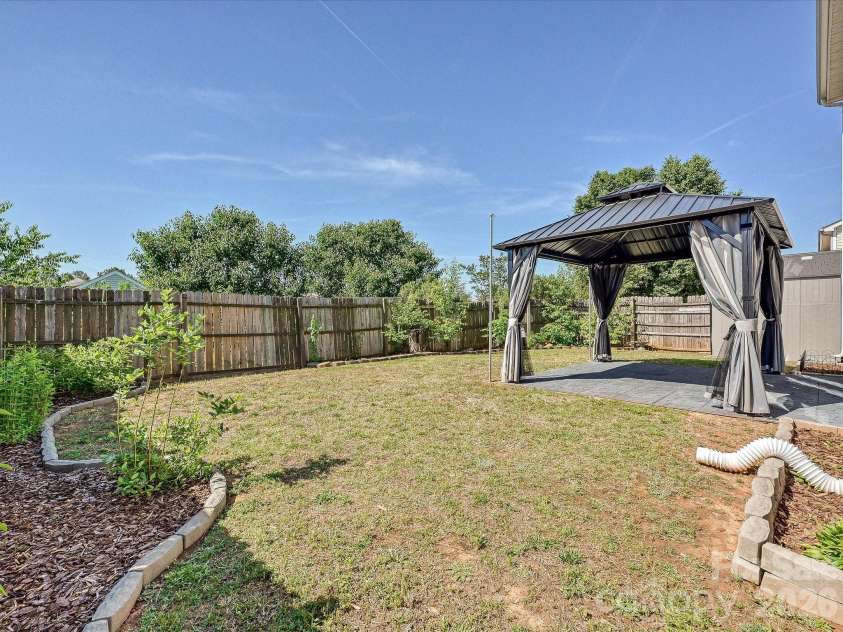3053 Brookchase Boulevard, Fort Mill, SC 29707.  MLS# CAR4374006, YatesRealty ID 28260. Fenced Back Yard