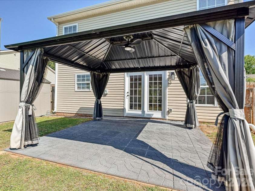 3053 Brookchase Boulevard, Fort Mill, SC 29707.  MLS# CAR4374006, YatesRealty ID 28260. Home Rear Exit