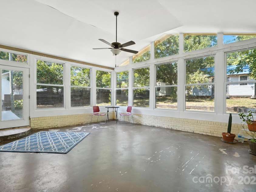 549 Spring Street, Concord, NC 28025.  MLS# CAR4284359, YatesRealty ID 28265. Absolutely amazing sunroom perfect for plant lovers, entertaining and so much more!