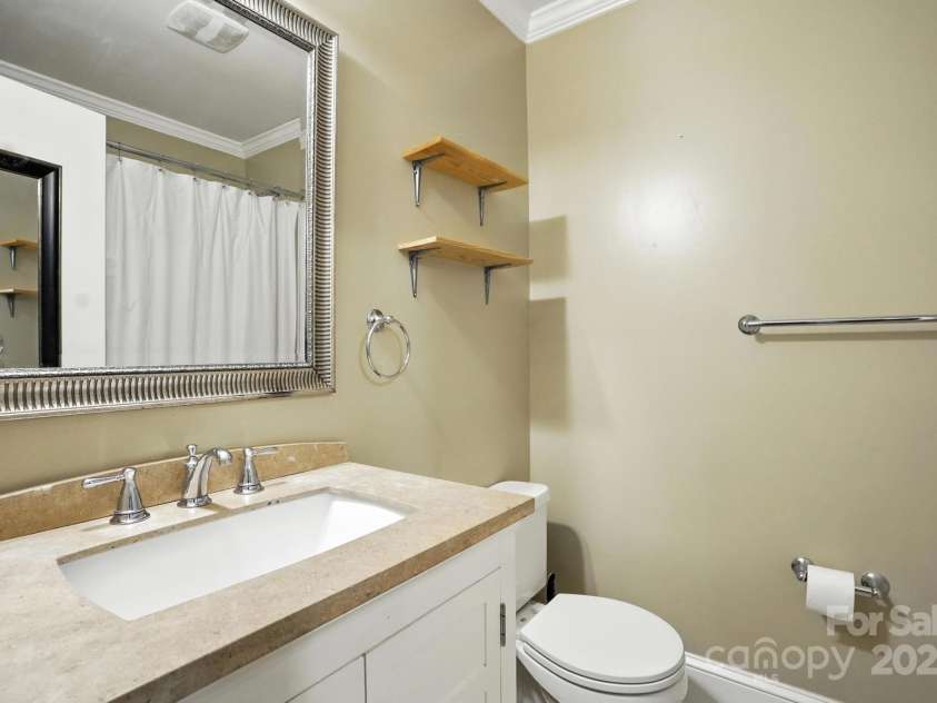549 Spring Street, Concord, NC 28025.  MLS# CAR4284359, YatesRealty ID 28265. Full hallway bathroom