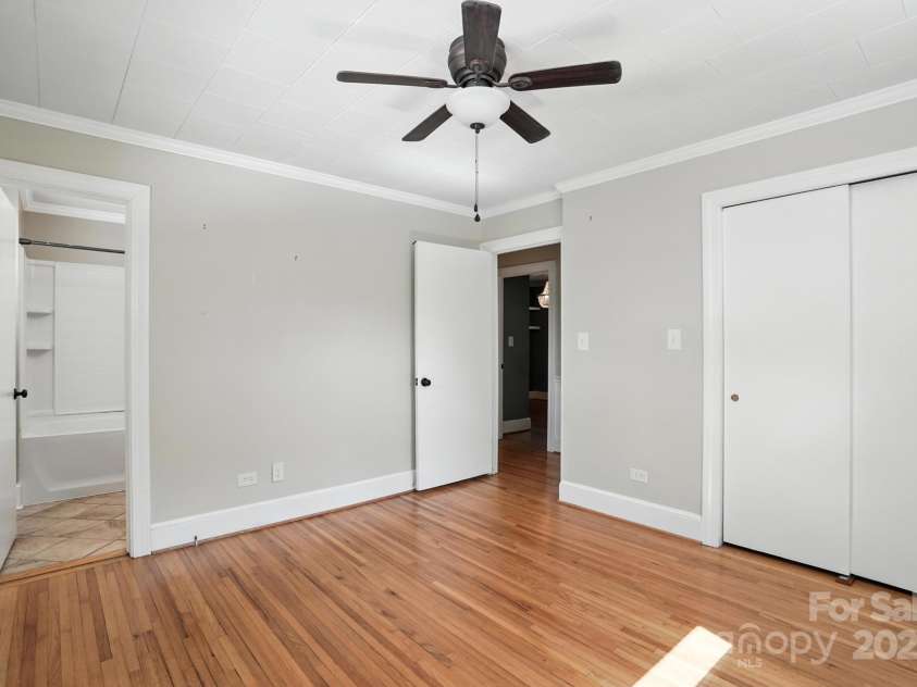 549 Spring Street, Concord, NC 28025.  MLS# CAR4284359, YatesRealty ID 28265. Primary bedroom with ensuite bathroom