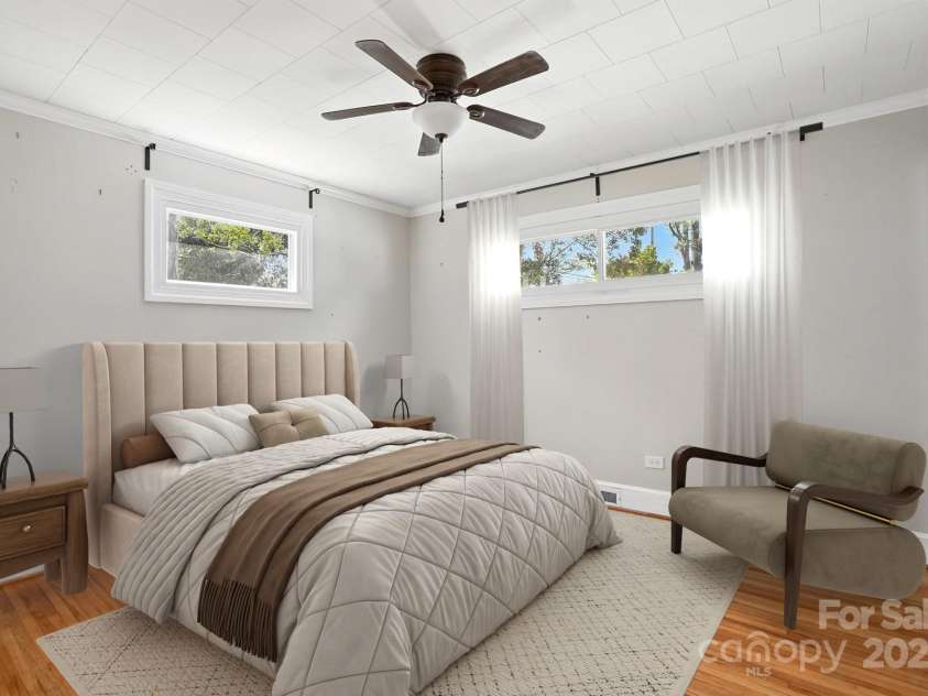 549 Spring Street, Concord, NC 28025.  MLS# CAR4284359, YatesRealty ID 28265. Virtually staged - Primary bedroom