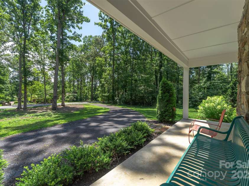 22 Glen Cove Road, Arden, NC 28704.  MLS# CAR4272199, YatesRealty ID 28269. Front porch views