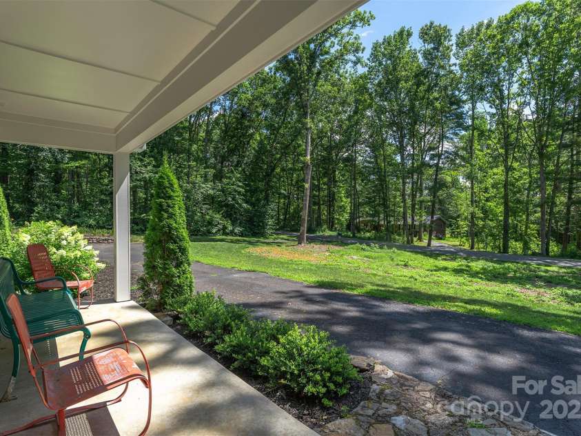 22 Glen Cove Road, Arden, NC 28704.  MLS# CAR4272199, YatesRealty ID 28269. Front porch views