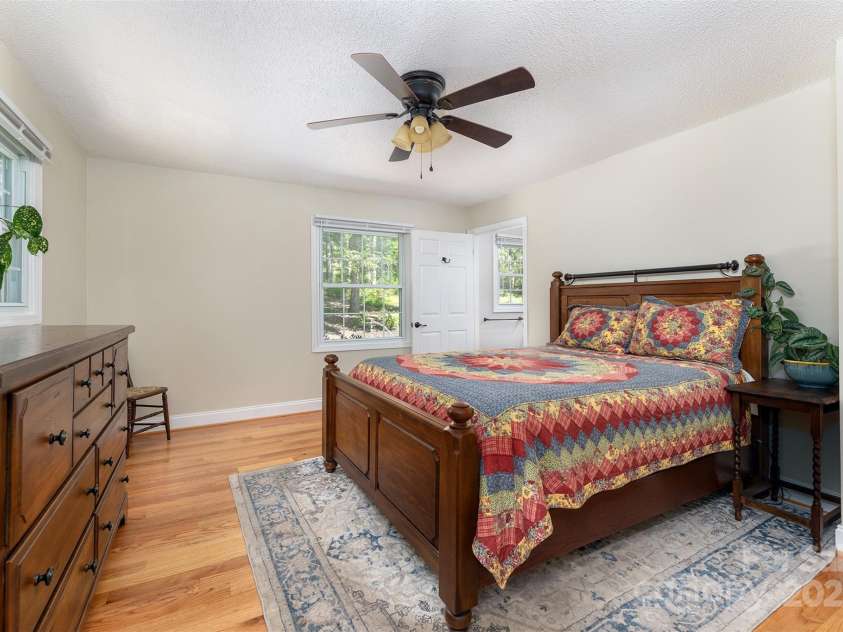 22 Glen Cove Road, Arden, NC 28704.  MLS# CAR4272199, YatesRealty ID 28269. Primary bedroom