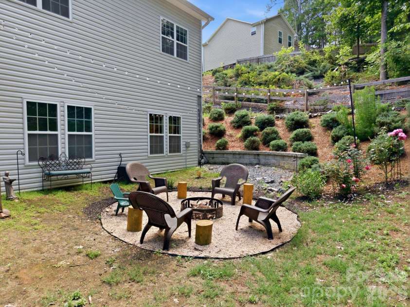 2960 Walter Drive, Concord, NC 28027.  MLS# CAR4373915, YatesRealty ID 28272. Firepit