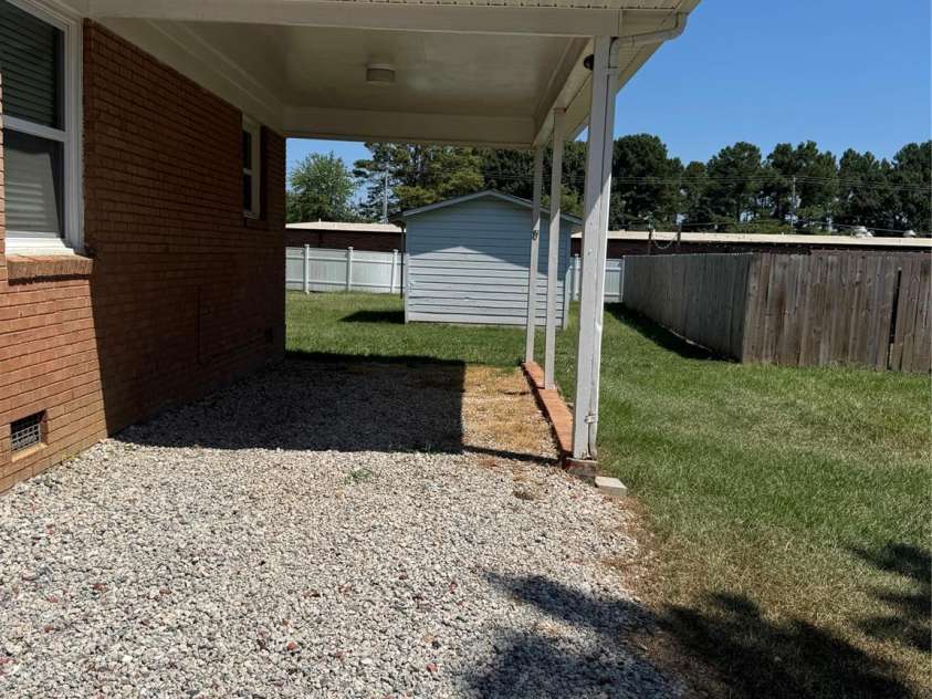 1001 Cone Avenue, Pineville, NC 28134.  MLS# CAR4283461, YatesRealty ID 28275. ATTACHED CARPORT