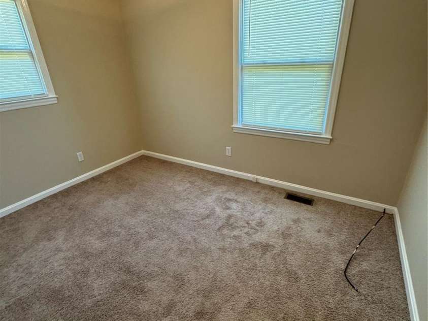 1001 Cone Avenue, Pineville, NC 28134.  MLS# CAR4283461, YatesRealty ID 28275. BEDROOM 2 CARPET, BLINDS, LIGHTING