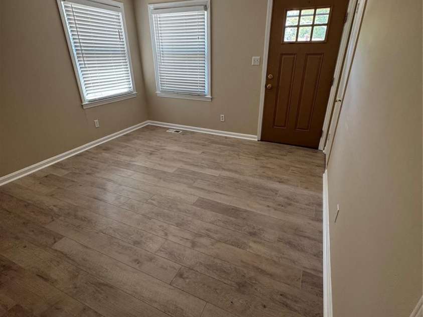 1001 Cone Avenue, Pineville, NC 28134.  MLS# CAR4283461, YatesRealty ID 28275. BRIGHT LIVING ROOM UPDTED DOOR, BLINDS