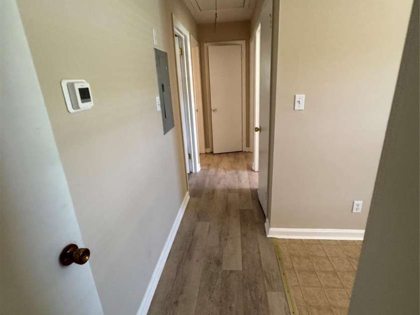 1001 Cone Avenue, Pineville, NC 28134.  MLS# CAR4283461, YatesRealty ID 28275. HALL WITH LVP FLOORING