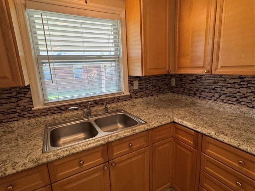 1001 Cone Avenue, Pineville, NC 28134.  MLS# CAR4283461, YatesRealty ID 28275. KITCHEN UPDATED LIGHTING, COUNTERTOPS, CABINETS