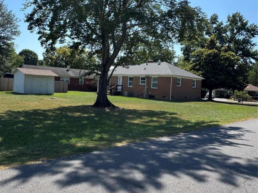 1001 Cone Avenue, Pineville, NC 28134.  MLS# CAR4283461, YatesRealty ID 28275. LARGE FLAT REAR YARD