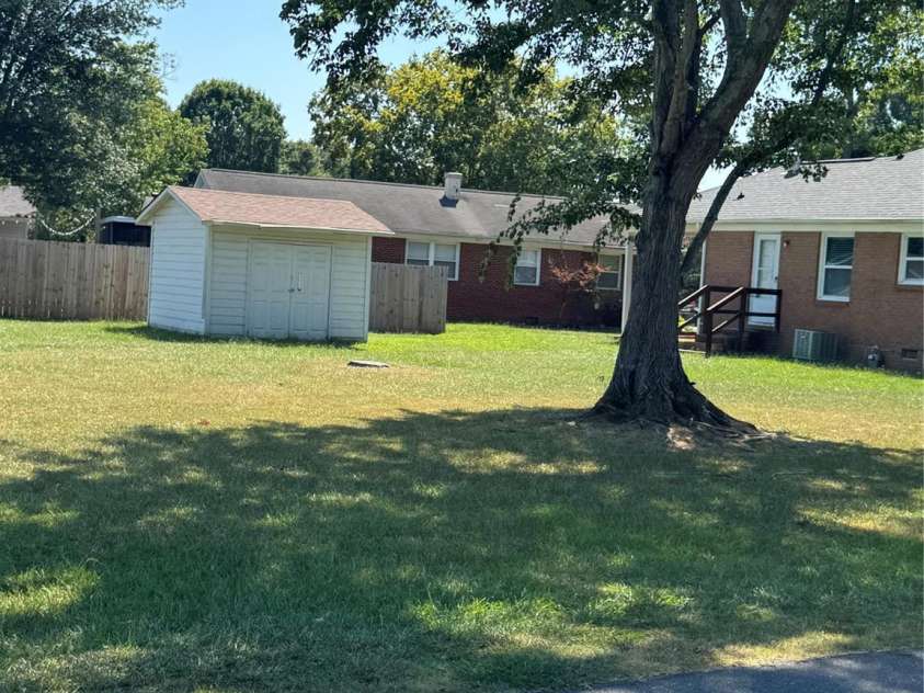 1001 Cone Avenue, Pineville, NC 28134.  MLS# CAR4283461, YatesRealty ID 28275. LARGE REAR YARD W/ MAPLE TREE