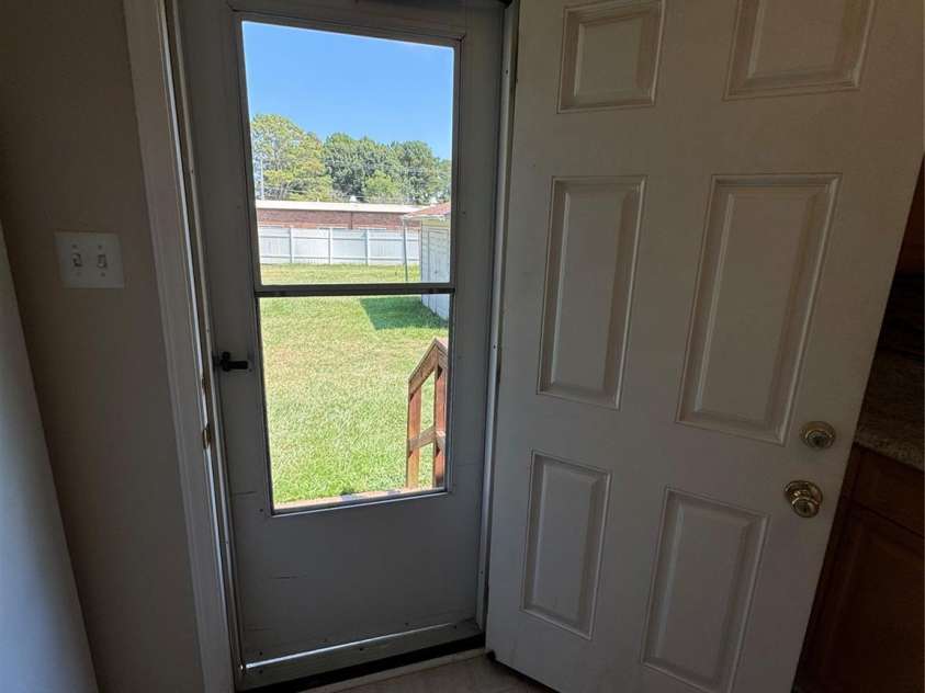 1001 Cone Avenue, Pineville, NC 28134.  MLS# CAR4283461, YatesRealty ID 28275. REAR STORM DOOR