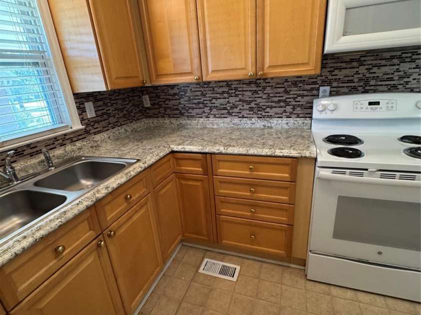 1001 Cone Avenue, Pineville, NC 28134.  MLS# CAR4283461, YatesRealty ID 28275. UPDATED CABINETS