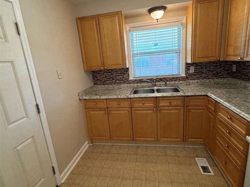 1001 Cone Avenue, Pineville, NC 28134.  MLS# CAR4283461, YatesRealty ID 28275. UPDATED KITCHEN, COUNTERS, FIXTURES