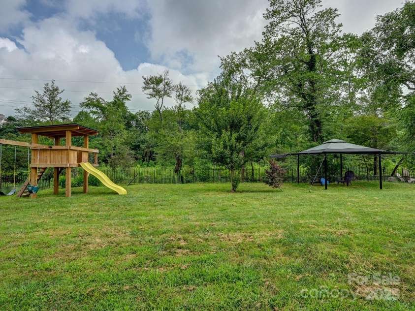 218 Blue Ridge Road, Black Mountain, NC 28711.  MLS# CAR4284698, YatesRealty ID 28276. Enjoy sitting under the gazebo next to the river