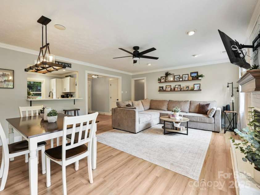 218 Blue Ridge Road, Black Mountain, NC 28711.  MLS# CAR4284698, YatesRealty ID 28276. Full view of living room and dining area