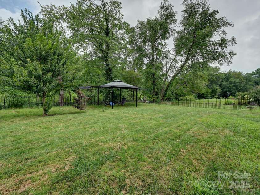 218 Blue Ridge Road, Black Mountain, NC 28711.  MLS# CAR4284698, YatesRealty ID 28276. Great big fenced in back yard