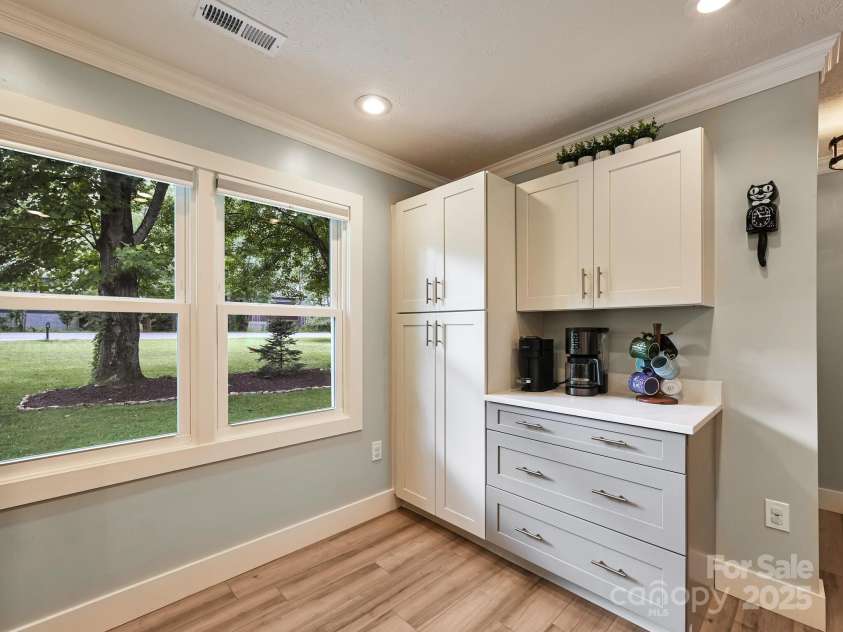 218 Blue Ridge Road, Black Mountain, NC 28711.  MLS# CAR4284698, YatesRealty ID 28276. Kitchen has a Pantry Cabinet and a Coffee Bar