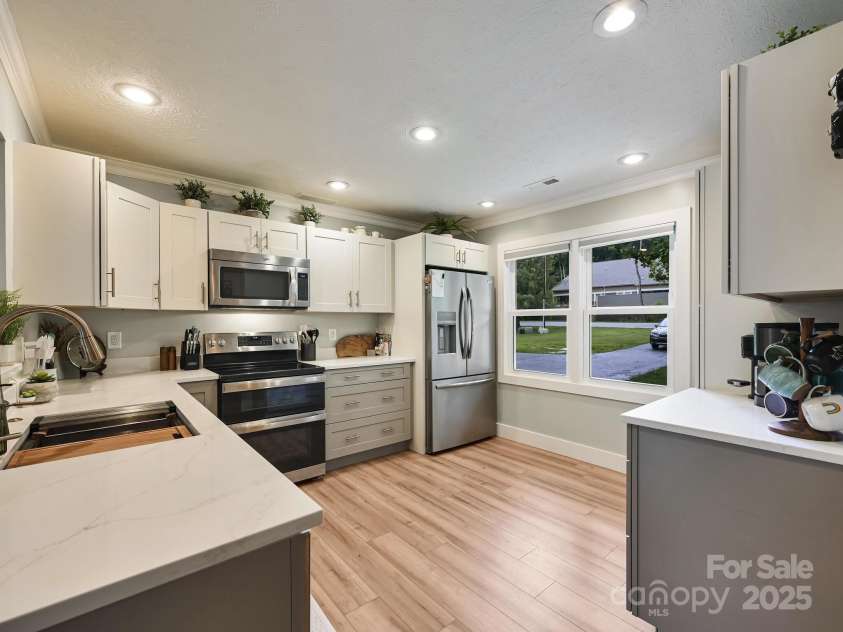 218 Blue Ridge Road, Black Mountain, NC 28711.  MLS# CAR4284698, YatesRealty ID 28276. Quartz Counter Tops and SS Appliances