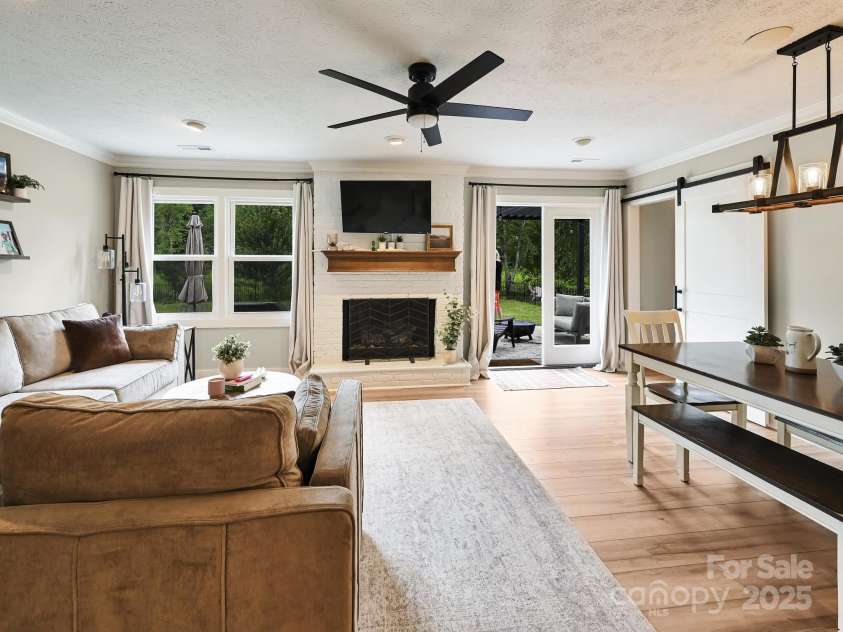 218 Blue Ridge Road, Black Mountain, NC 28711.  MLS# CAR4284698, YatesRealty ID 28276. View of living and dining from the foyer