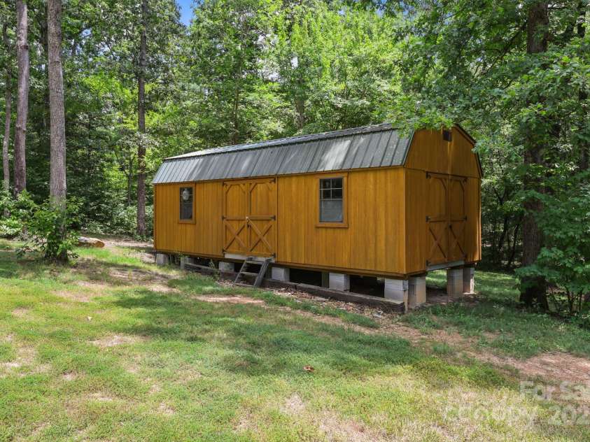 25611 Bridgeport Road, Albemarle, NC 28001.  MLS# CAR4280834, YatesRealty ID 28279. Large Shed