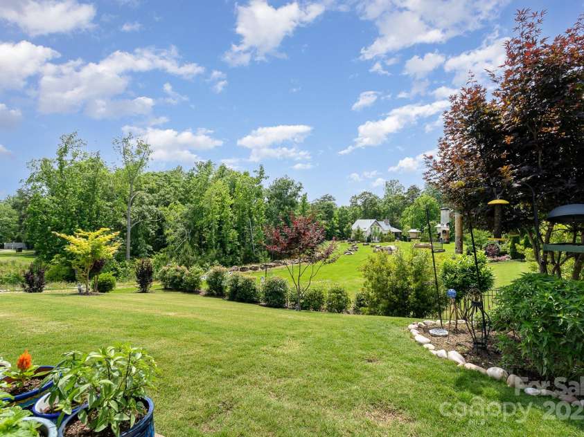 10016 St Kitts Landing Lane, Charlotte, NC 28278.  MLS# CAR4261578, YatesRealty ID 28282. Beautiful back yard view