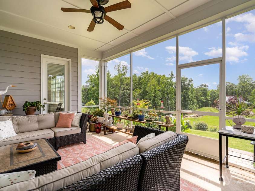 10016 St Kitts Landing Lane, Charlotte, NC 28278.  MLS# CAR4261578, YatesRealty ID 28282. Expansive screened porch
