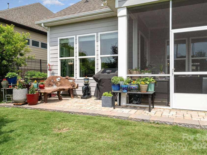 10016 St Kitts Landing Lane, Charlotte, NC 28278.  MLS# CAR4261578, YatesRealty ID 28282. Rear stone paver patio w/built-in gas line for grill