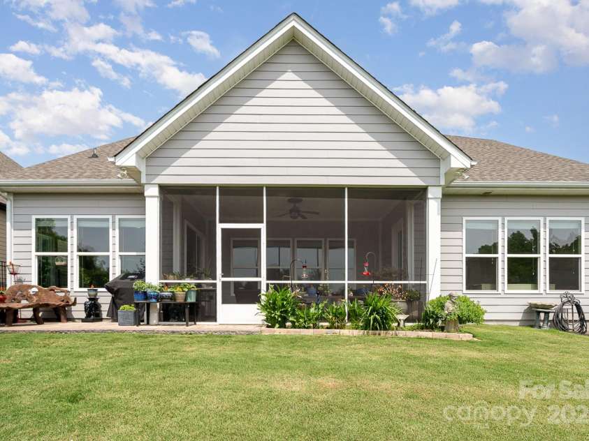 10016 St Kitts Landing Lane, Charlotte, NC 28278.  MLS# CAR4261578, YatesRealty ID 28282. Rear view of home