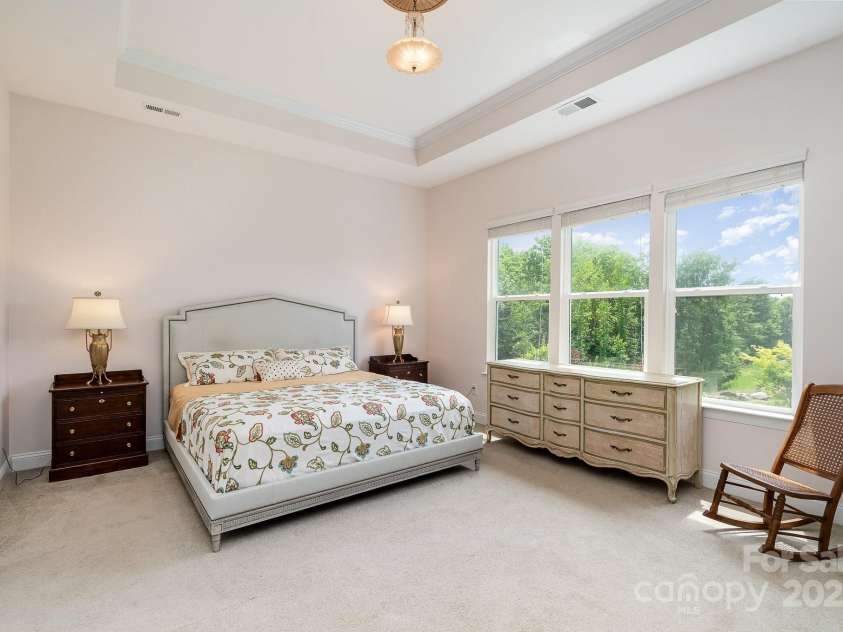 10016 St Kitts Landing Lane, Charlotte, NC 28278.  MLS# CAR4261578, YatesRealty ID 28282. Tranquil primary bedroom w/view