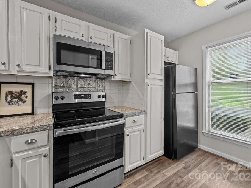 9033 J M Keynes Drive, Charlotte, NC 28262.  MLS# CAR4292909, YatesRealty ID 28293. 