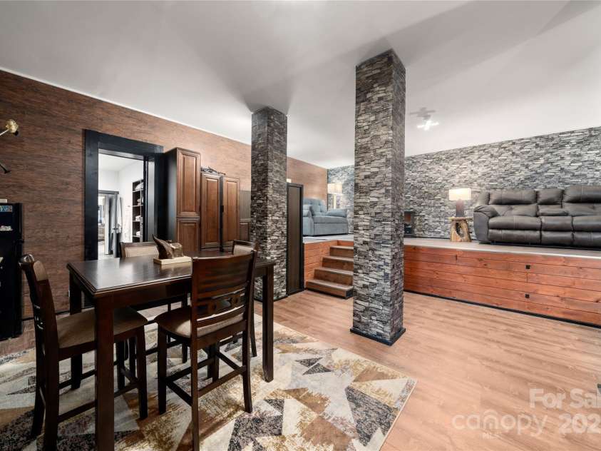 41 Ben Lippen School Road, Asheville, NC 28806.  MLS# CAR4316852, YatesRealty ID 28296. Hidden safe room behind mirrored door has ample supply storage, self contained utilities and access to secure full bath. 