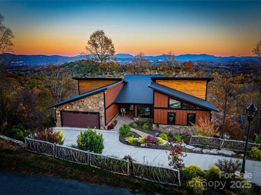 41 Ben Lippen School Road, Asheville, NC 28806.  MLS# CAR4316852, YatesRealty ID 28296. Hundreds of thousands of dollars of stunning landscaping adorn the grounds. Fencing imported from Indonesia must be seen to be appreciated. 