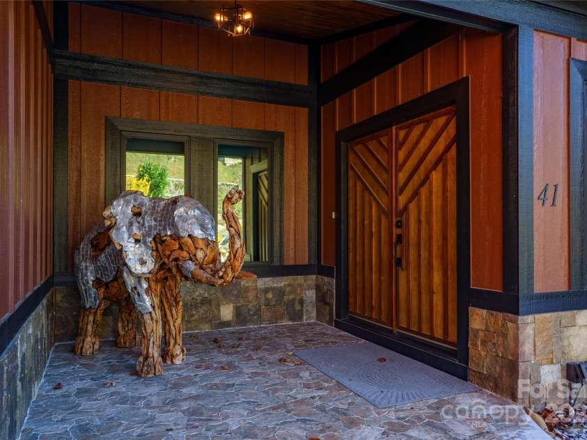 41 Ben Lippen School Road, Asheville, NC 28806.  MLS# CAR4316852, YatesRealty ID 28296. Inviting stone covered entry 