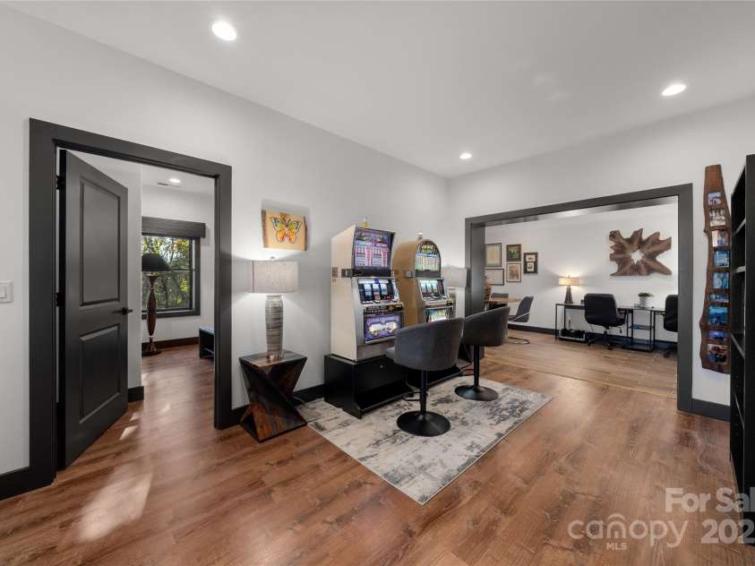 41 Ben Lippen School Road, Asheville, NC 28806.  MLS# CAR4316852, YatesRealty ID 28296. Lower level gathering area is it's own apartment with 2 bedrooms, kitchenette, full bath and close off door. 