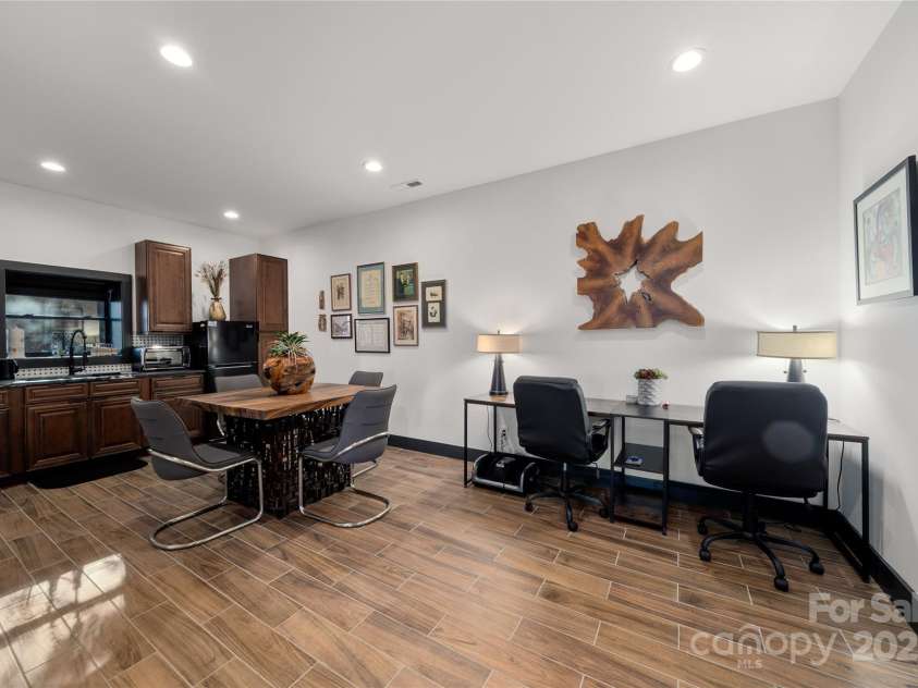 41 Ben Lippen School Road, Asheville, NC 28806.  MLS# CAR4316852, YatesRealty ID 28296. Lower level kitchenette and work space.