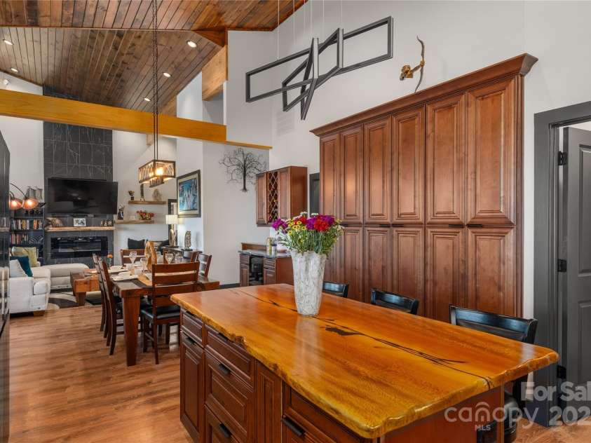 41 Ben Lippen School Road, Asheville, NC 28806.  MLS# CAR4316852, YatesRealty ID 28296. Massive custom cabinet storage along far wall.