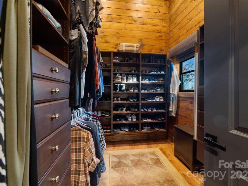41 Ben Lippen School Road, Asheville, NC 28806.  MLS# CAR4316852, YatesRealty ID 28296. One of two cleverly custom designed closets with many convenient features.