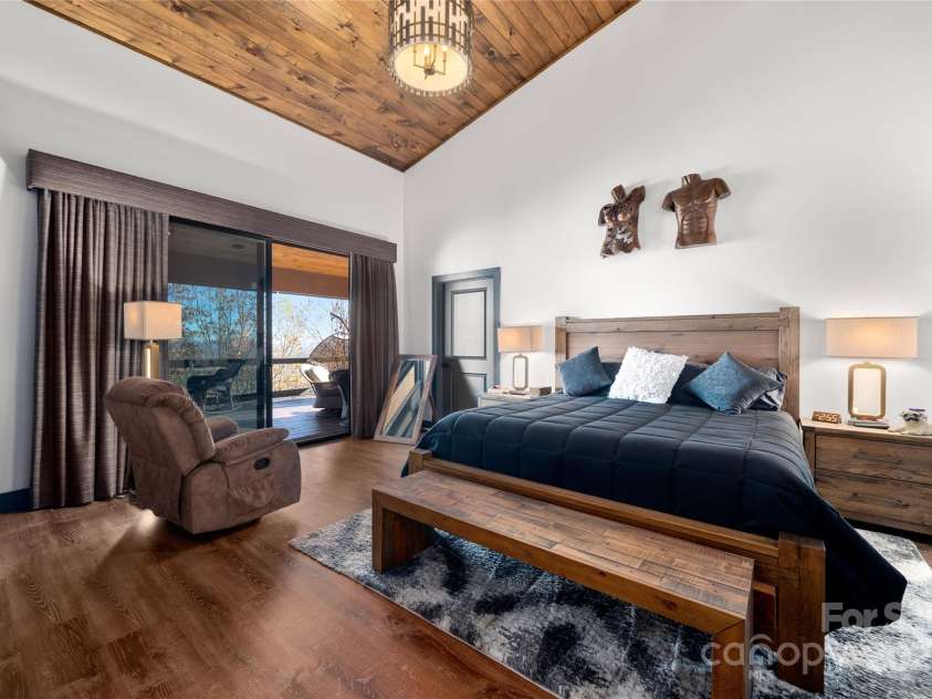41 Ben Lippen School Road, Asheville, NC 28806.  MLS# CAR4316852, YatesRealty ID 28296. Primary retreat with access to the covered deck and inspiring views.